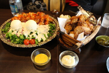 Korean fried chicken and salad at restaurant