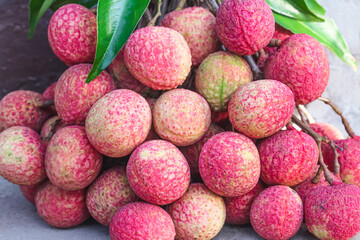 Close up fresh red ripe lychee or litchi chinensis tropical fruits