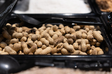 peanut in a shell on a store shelf, close view