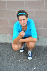 Female tomboy expressions outdoors.