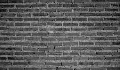 Fototapeta premium Texture of black brick wall or wallpaper background