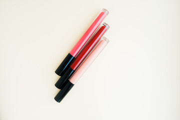 liquid lipstick in a tube on a light background