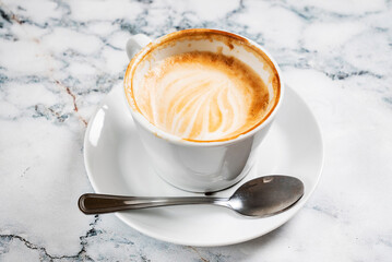 cup of cappuccino on the marble background