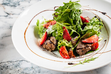 salad with strawberries and duck liver