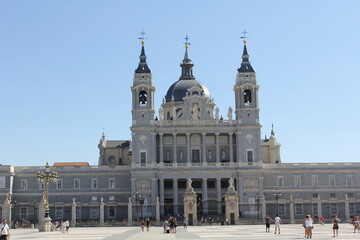 The architecture is old and beautiful, with a tall dome close to the sky.