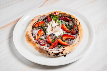 strawberry pizza with chocolate and ice cream