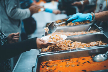 Providing free food for the poor hunger : concept of feeding, helping and sharing