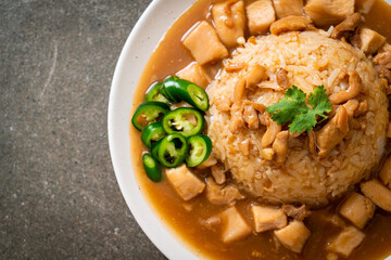 Chicken in brown sauce or gravy sauce with rice
