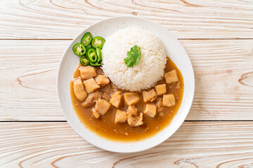 Chicken in brown sauce or gravy sauce with rice