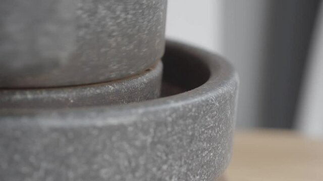 grinding coffee bean with millstone