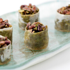 Pistachios with sweetened rolls