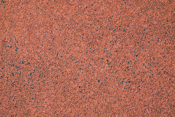 Empty red running track in stadium. Top view