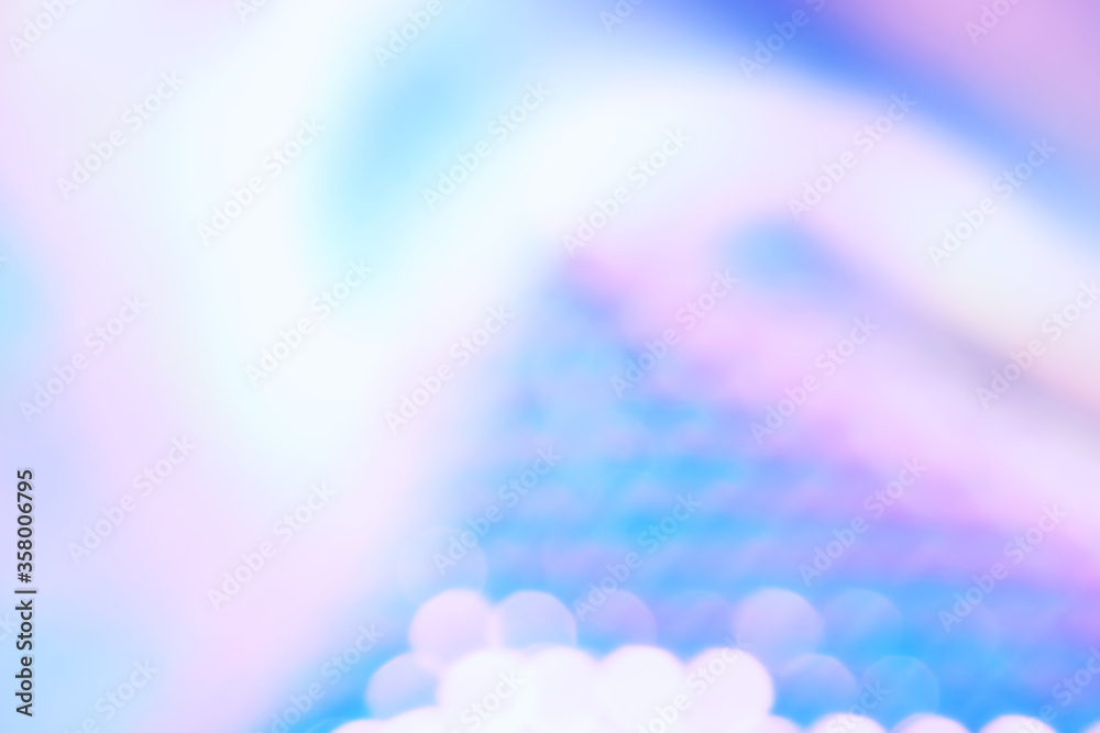 Aufkleber Holographic color foil with shiny reflections and bokeh light effect. Abstract blurred holographic foil background with trendy ultra violet light pastel colors.