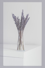 Framed image of dried lavender in a small vase, faded colors. Template with space for text