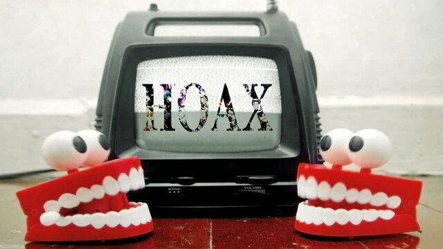 two funny toy teeth chatting with retro TV fake news concept 