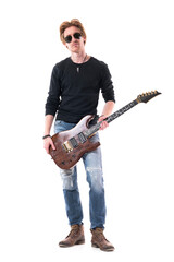Cool attitude serious young rock musician male holding electric guitar looking at camera. Full body length isolated on white background. 