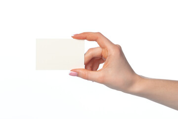 Fototapeta premium Female hand with blank white business card isolated on white