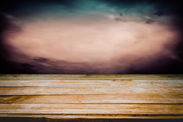 Old wooden table with dark horror texture background for Halloween season concept. Copy space for text and ideal for product placement.