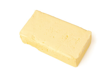 Block of butter isolated on white background