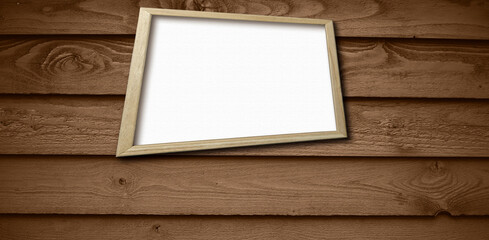 Fototapeta premium blank white frame on wooden background.