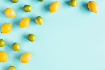 Lemons on blue background. Flat lay, top view