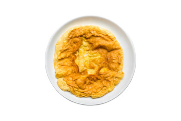 Above view of omelette in ceramic plate isolated on white background. Omelet it's egg fry popular traditional Thai asia style food. Top view