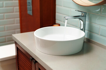 Modern bathroom interior with white ceramic sink