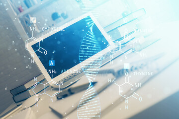 Desktop computer background and DNA drawing. Double exposure. Science concept.