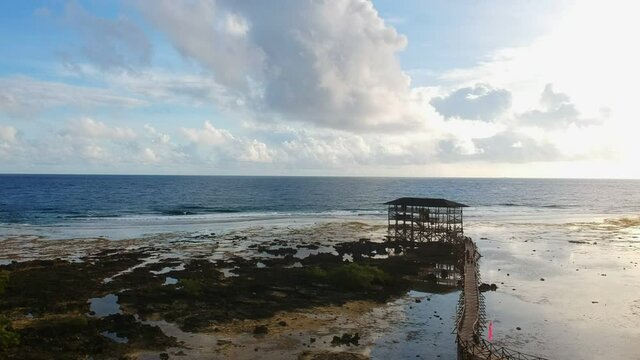 Viewing tower on a rocky beach for viewing the sunset or sunrise or surfers surfing