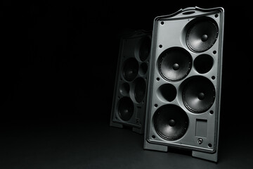 Audio system stereo column on dark background