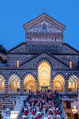 Fototapeta premium Amalfi Folk New Year's parade at Amalfi Cathedral, Italy. Christmas events and traditions