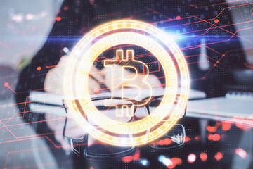 Cryptocurrency hologram over woman's hands writing background. Concept of blockchain. Multi exposure