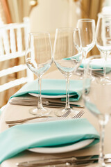 Beautifully decorated table setting at a wedding reception, birthday or Valentine's day. Floral decorations for the holiday.