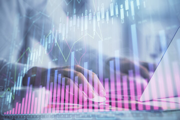 Double exposure of forex graph with man working on computer on background. Concept of market analysis.