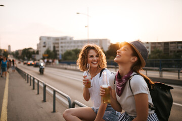 Drinking and having a good time in the summer in the city.