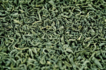 green tea leaves on white