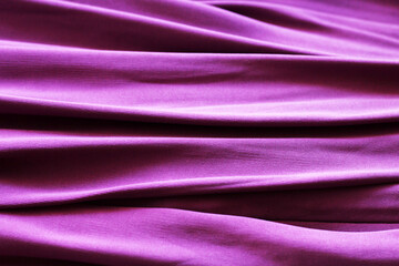 Pink satin fabric with pleats background