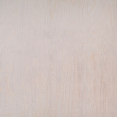 Beige background from plywood close up. Background for your lettering.