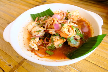 Spicy Shrimp or Spicy Shrimp salad ( Larb Shrimp). Thai style spicy and delicious. Served with mixed fresh vegetables, and many herb. 