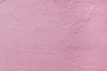 Pink stucco texture. Architectural abstract background. Pink wall of building.