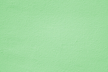 Green stucco texture. Architectural abstract background. Pistachio wall of building.