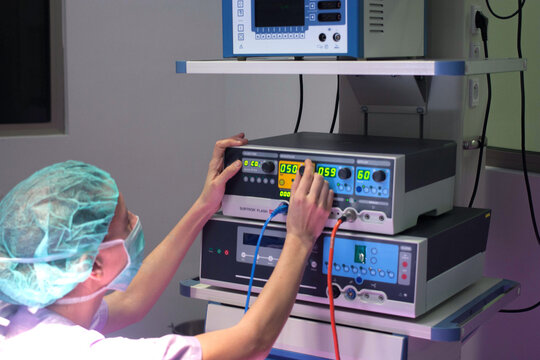 Woman working to prepare optimal laboratory medical equipment for surgery and medicine