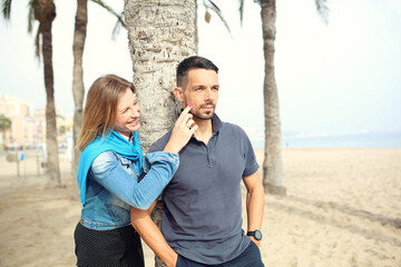 Couple on the beach. Happy young people in love on the beach