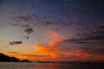 Fototapeta na wymiar Sunset sky clouds on the beach. Texture
