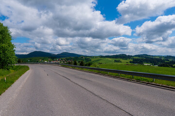 Mountain valley village and road landscape summer. Mountain village view. Village in mountains. Mountain valley village landscape in slovakia