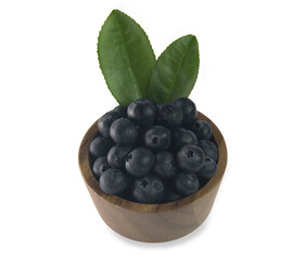 blueberries in wooden bowl isolated on white background