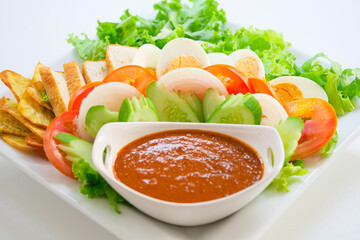 Muslim salad and salad dressing made from roasted peanuts