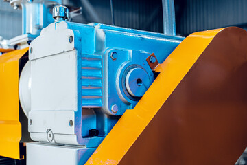 Close up photo of production in the industry with various machines