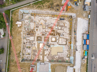 Fototapeta premium Aerial view of construction site in Switzerland with large crane.