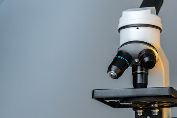 Fototapeta na wymiar Scientific microscope lenses close up. Laboratory equipment